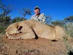 Photo of Wes with a large lion
