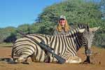 Photo of Sue with a large zebra